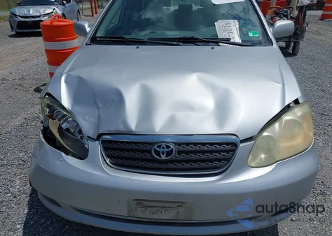 2005 Toyota Corolla Le from USA, damaged, VIN 2T1BR30E65C451295